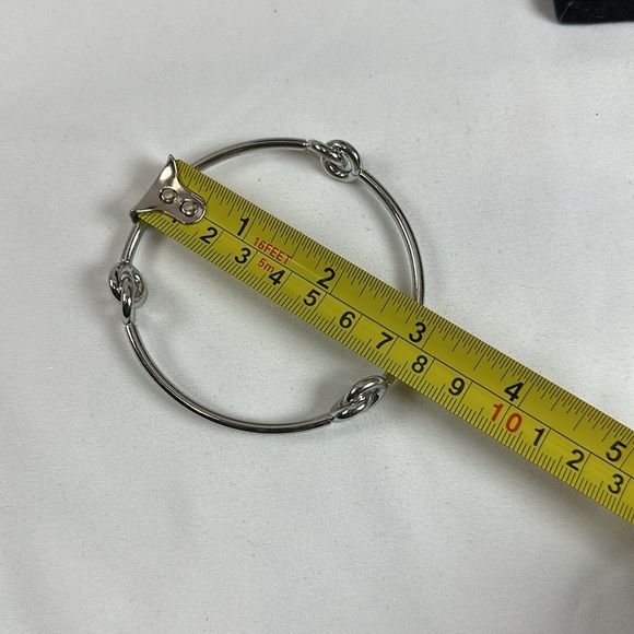 Elegant Silver Tone Knot Bracelet - Picture 7 of 7